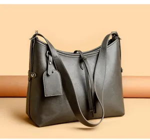 Detail view of retro women hobo shoulder bag, large capacity daily commuting crossbody bag.