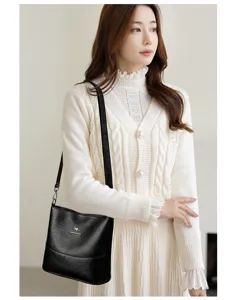Women's retro soft leather shoulder bag, casual commuting tote, stylish daily wear detail view.