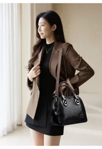 Stylish large capacity shoulder bag for women, retro black PU leather handbag with braided handle.