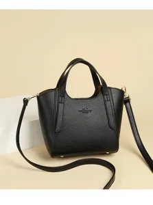 Chic black bucket shoulder bag for women, stylish leather crossbody purse for work.