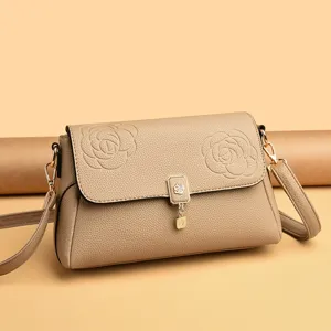 Damen Umhängetasche aus weichem Leder mit Prägung, elegante Freizeittasche mit Blumenmuster.