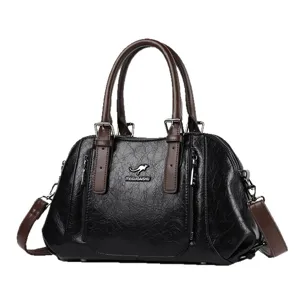 Elegant black leather handbag for women, large capacity stylish shoulder and crossbody bag.