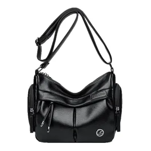 Black leather women's shoulder bag with multi-pocket slouchy design and adjustable strap.