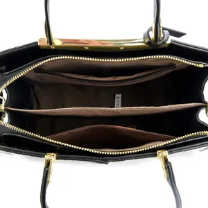Elegante zwarte lederen damestas handtas schoudertas met gouden hardware details