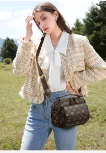Stylish women's monogram shoulder bag, chic retro crossbody handbag with adjustable strap.