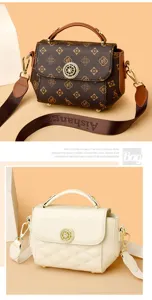 Trendy women's shoulder crossbody bag with retro monogram pattern and chic minimalist design.