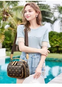 Stylish women crossbody bag with monogram pattern and multi-pocket design, perfect for travel.