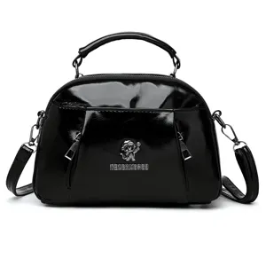 Black patent leather shoulder bag for women, stylish crossbody handbag with top handle.
