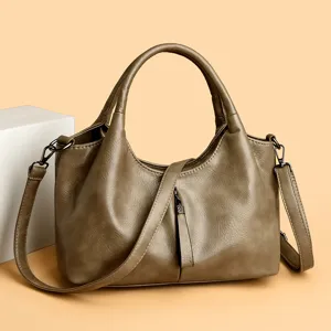 Stylish women's leather shoulder bag, versatile crossbody tote and chic hobo handbag.