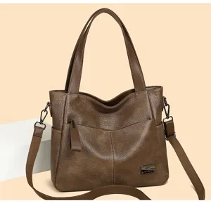 Vintage brown PU leather tote bag for women, stylish casual shoulder and crossbody design daily.