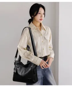 Stylish black PU leather shoulder bag for women, versatile crossbody design with spacious capacity.