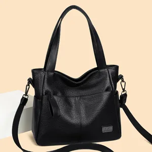 Black PU leather shoulder bag for women, stylish crossbody tote with top handles and multi pockets.