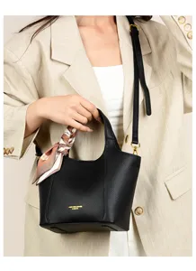 Elegant black PU leather women handbag featuring adjustable shoulder strap and stylish silk scarf.
