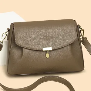 Stylish brown PU leather shoulder crossbody bag for women, elegant flap design with metal clasp.