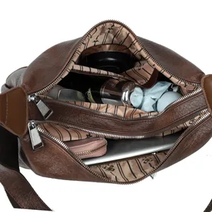 Sac à bandoulière marron en cuir PU multi-compartiments avec un espace de rangement spacieux.