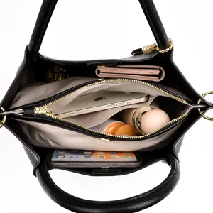 Black PU leather tote bag with large capacity, top handle and multi-compartment interior.