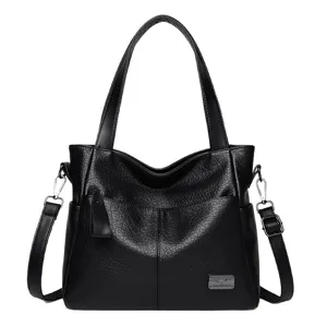 Black PU leather women shoulder bag crossbody tote handbag with multiple pockets and strap.