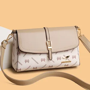 Sac à bandoulière élégant en cuir PU pour femme, sac à main tendance avec boucle en métal.