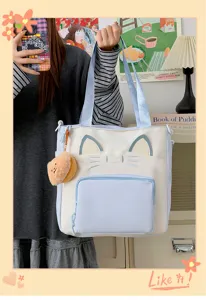 Cute cat themed color-blocked tote bag detail view, showing embroidery whiskers and cat ears.