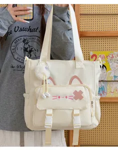 Cute cat canvas tote bag large capacity student shoulder messenger bag with plush pom-pom
