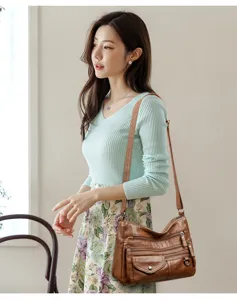 Stylish multi-pocket PU shoulder crossbody bag for women, everyday casual design.