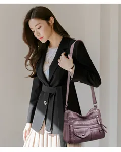 Stylish purple PU leather shoulder crossbody bag with multi pockets for women daily use.