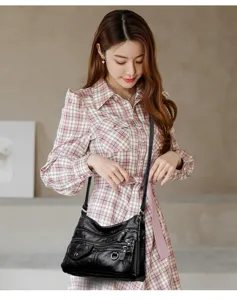 detail view of stylish black pu leather crossbody shoulder bag multi pocket design