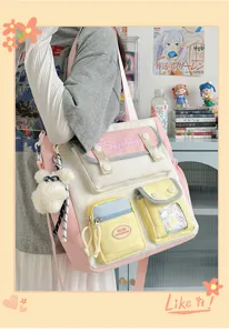 Multi-pocket canvas shoulder bag lifestyle detail showcasing trendy Japanese aesthetic style.