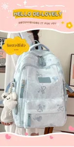 Cute korean style blue bear print school backpack with multi compartments and fluffy bear pendant.