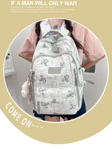 Detail view of Korean style cute bear print school backpack with multi compartments.