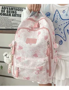 Pink aesthetic bear print school backpack featuring multi compartments for students.
