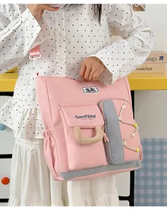Bolso bandolera rosa de gran capacidad con multiples bolsillos para estudiantes y uso diario