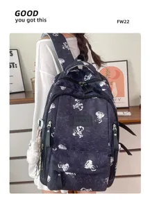Detail shot of the Korean style cute bear printed backpack featuring multi compartments and pendant.