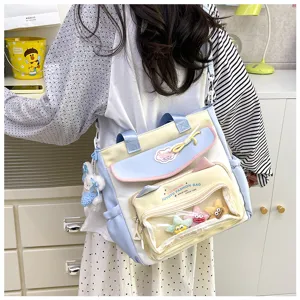 Cute canvas shoulder bag with transparent pocket, large capacity school book bag for daily use.