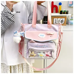 Cute pastel canvas tote bag with transparent pocket, large capacity school shoulder bag for girls.