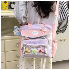 Cute multi-pocket canvas shoulder bag large capacity school bag for girls and students.