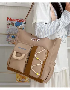 Bolso bandolera de lona con múltiples bolsillos y correa ajustable, bolso espacioso para estudiantes.