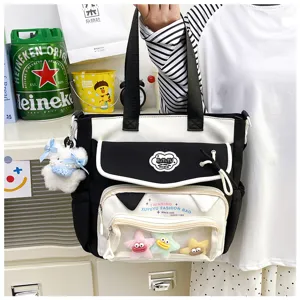 Black and white canvas tote bag with transparent pocket, cute student shoulder bag for daily use.