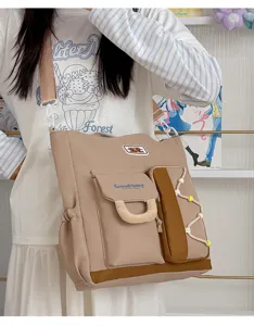 Gran bolso bandolera de lona con múltiples bolsillos para el trabajo y la escuela.