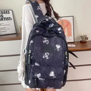 Stylish casual canvas backpack with cute bear print, multi-compartment design for daily use.