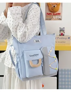 Bolso bandolera de lona de gran capacidad con múltiples bolsillos para estudio y diario.