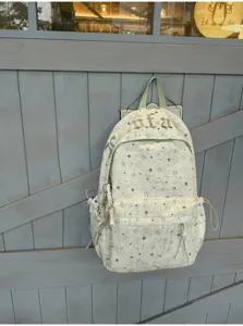 Korean ins style star print backpack, large capacity casual school bag for students.