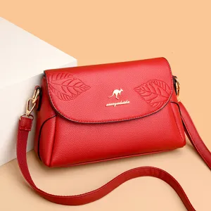 Elegant red leather women shoulder bag with stylish flap and leaf embossing for daily use.