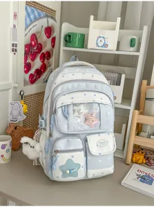 Cute light blue star backpack for women and students, spacious daily school bag detail view.
