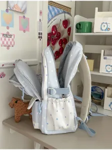 Light blue cute star school backpack for students, large capacity casual daypack daily use.