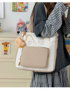 Canvas cat tote bag with cute bear pendant, large capacity shoulder bag for daily use.