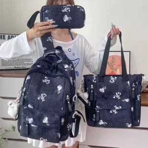 Multi-compartment backpack set with cute cartoon print, ideal for school students and daily use.