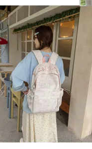 Korean style star pattern backpack for students, large capacity casual school bag for daily use.