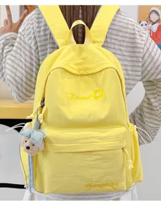 Japanese solid color college student backpack lightweight casual schoolbag for daily travel.