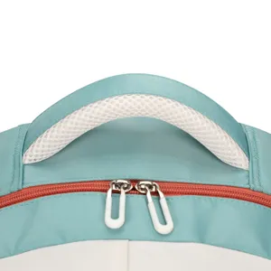 Backpack top handle detail showing breathable mesh and durable zipper design for daily campus use.